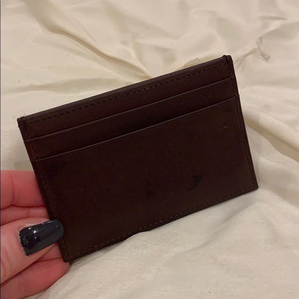 Brown Coach leather card wallet.